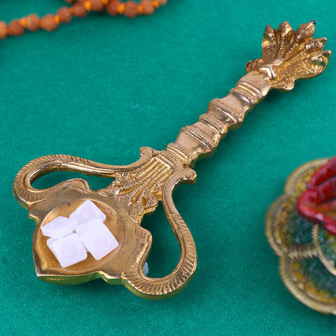Brass Pooja Aarti Sheshnaag Spoon, a beautifully designed brass spoon featuring the Sheshnaag (serpent) motif, used for performing aarti during pooja and spiritual rituals. 
Indiaβs Largest Pooja Accessories Brand β www.satvikstore.in