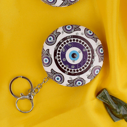 Cute Round Evil Eye Keychain with Foldable Mirror, a stylish accessory that combines protection, good luck, and convenience. Indiaβs Largest Pooja Accessories Brand β www.satvikstore.in
