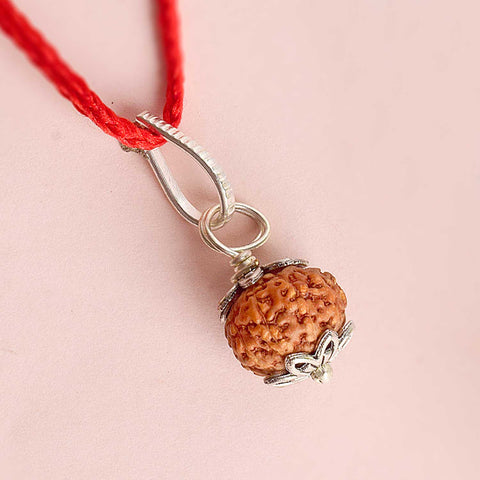 Certified 10 Mukhi Rudraksha Pendant with metal capping for peace and protection. Indiaβs Premium Rudraksha Jap Mala Store- www.satvikstore.in