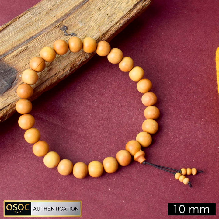 Pure 10mm Elastic 27 Bead White Chandan Money Mala made from authentic sandalwood for wealth attraction, spiritual protection, and daily meditation.India’s Premium Jap Mala Store - www.satvikstore.in