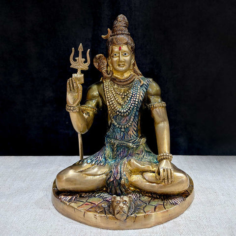 9.4 Inch Divine Brass Shiv Idol featuring Lord Shiva in a majestic seated pose, intricately crafted for home temple or spiritual decor. No.1 Brass Idol Store www.satvikstore.in 
