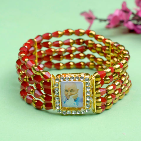 Jai Guruji Swaroop Pearl Bracelet adorned with Crystal Red Beads.