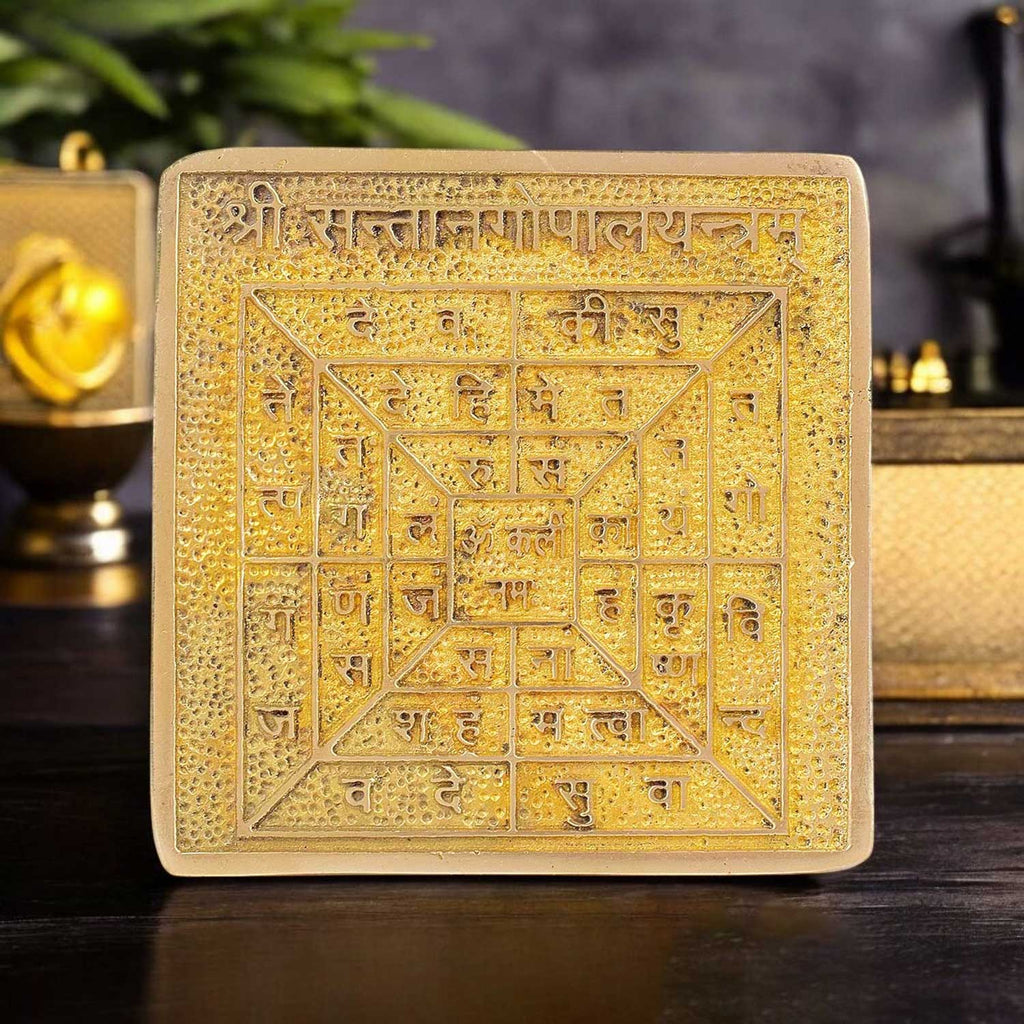 Brass Shree Santan Gopal Yantra engraved with divine child-form Krishna symbols, used for fertility, safe pregnancy, and blessings of healthy children. India’s Largest Pooja Accessories Brand - www.satvikstore.in


