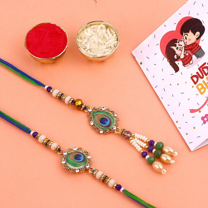 Elegant peacock-inspired Rakhi pair India’s Largest Pooja Accessories Brand – www.satvikstore.in

