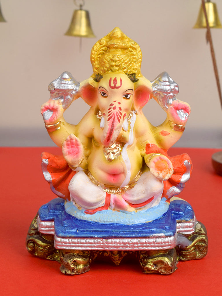 Handcrafted 5-inch eco Ganesha idol made of natural clay, designed for home puja and festivals, painted with safe, eco-friendly colors. India’s Largest Pooja Accessories Brand – www.satvikstore.in
