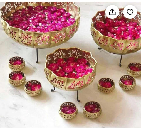 Striking Gold Lotus Diya Urli Set with 8 Votives – Elegant decorative urli set in a lotus design with gold finish, featuring 8 votive holders for festive and spiritual décor. India’s Largest Pooja Accessories Brand – www.satvikstore.in