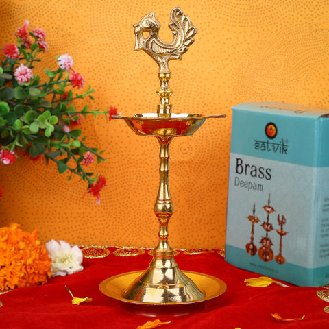 8 Inch Brass Peacock Kerala Diya – Handcrafted brass diya featuring a peacock motif, perfect for pooja rituals, temple lighting, and traditional décor. India’s Largest Pooja Accessories Brand – www.satvikstore.in