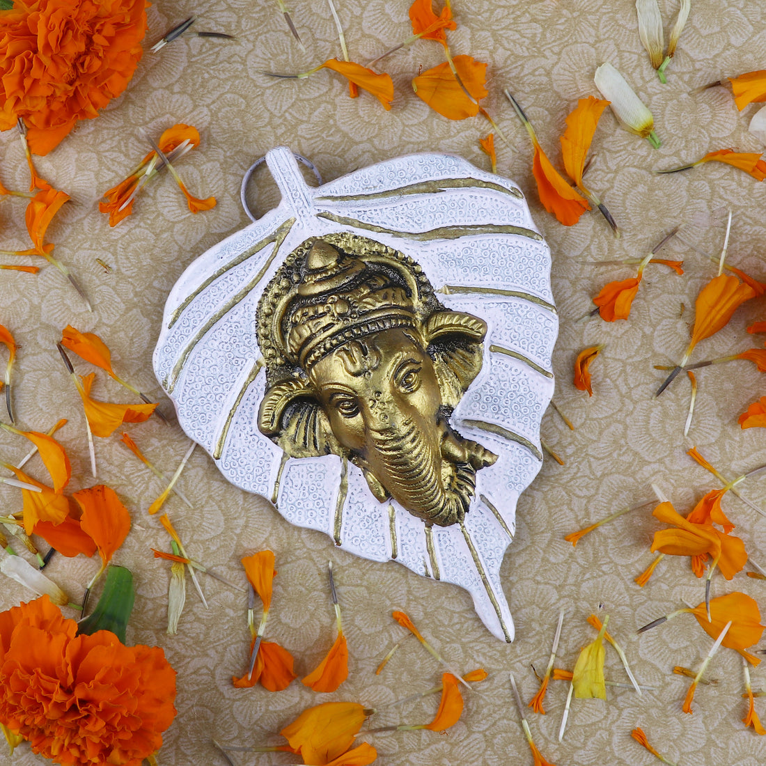 1 Pc Lord Ganesh Face on Leaf Patta Wall Hanging White